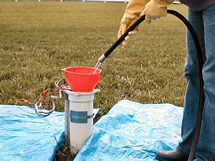 image showing garden hose in funnel