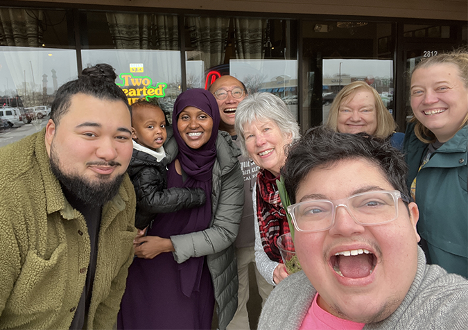 Health Equity Networks team members smile for team lunch photo