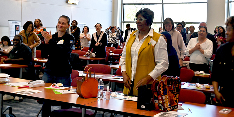 CCC representatives applaud a speaker at the CCC gathering