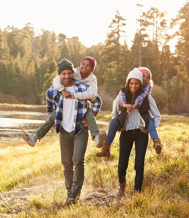 Family hiking through the woods