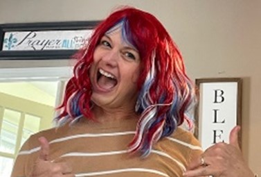 Amy Munson wearing a colorful wig