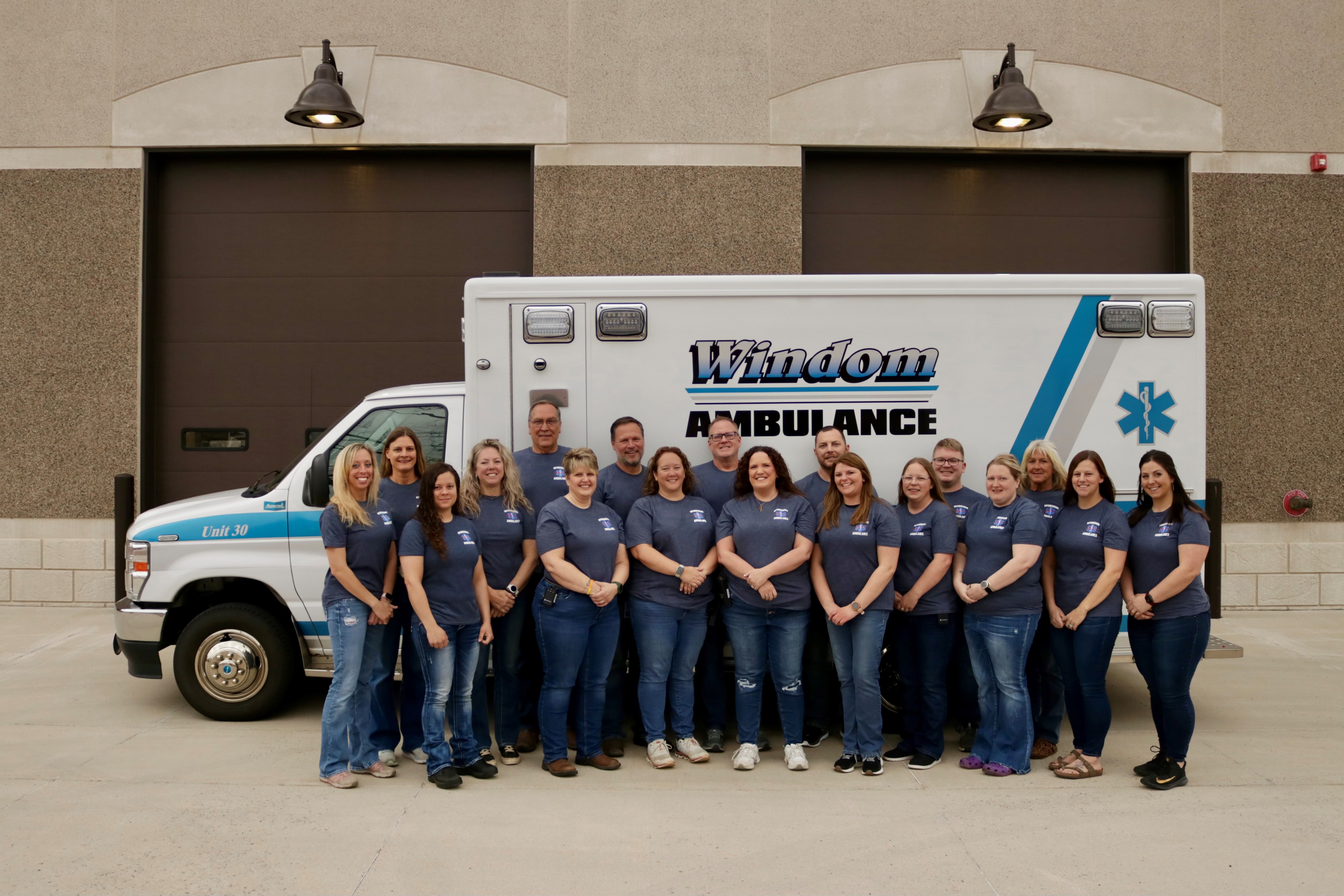 Windom Ambulance staff standing in front of ambulance