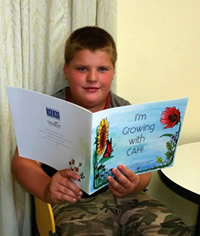 Young boy sharing the book