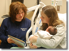 Nurse educating parent